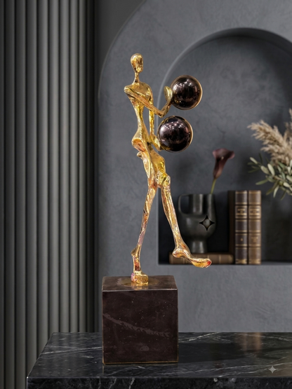 Golden Abstract Human Sculpture with Black Spheres